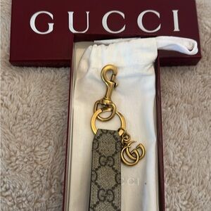 Gucci Keychain with Gold and Gray Tones